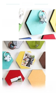 Macro detail of hexagonal felt wall tiles in multiple vibrant colors for photo display