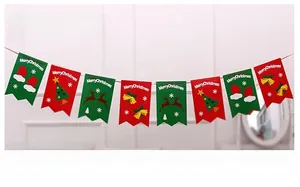 Detail view of red and green Merry Christmas banners with reindeer and tree patterns
