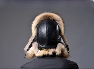 Rear view of a winter aviator hat with black leather and thick brown fox fur trim