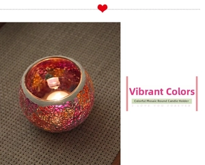 Detail of colorful mosaic glass candle holder with vibrant light shadows on a woven mat