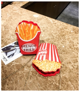 Detailed view of novelty popcorn and french fries crossbody bags with gold chain straps