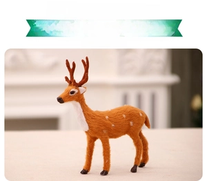 Detailed close-up of a small lifelike reindeer ornament with soft flocking texture
