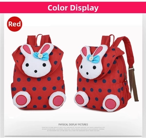 Detail view of red rabbit canvas kids backpack with polka dots and 3D bunny ears