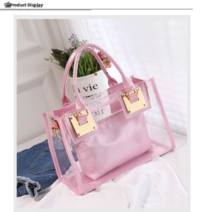 Detailed view of pink jelly tote bag with PVC material and satin inner pouch
