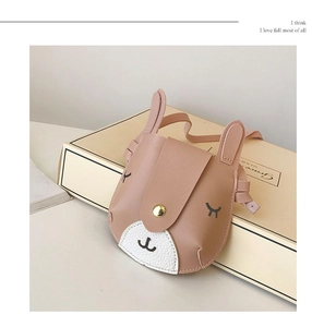 Detail of pink PU leather girls' mini crossbody bag with cute animal eyelash embroidery