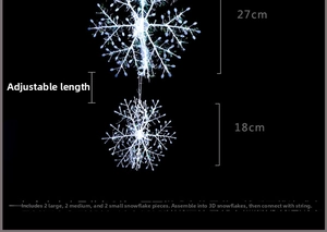 Detailed view of 3D white glitter snowflake ornaments in 27cm and 18cm sizes