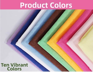 Close-up of microfiber hair towels in ten vibrant colors stacked on a white background
