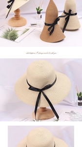 Close-up of fine woven straw sun hat with elegant black ribbon bow in beige and khaki