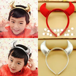 Detail view of cute 3D reindeer horn hairbands for girls in red, gold, and silver colors