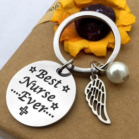 Llavero Grabado de Acero Inoxidable Best Nurse Ever Colgante de Ala de Ángel Con Perla Artificial Regalo Día de la Enfermera