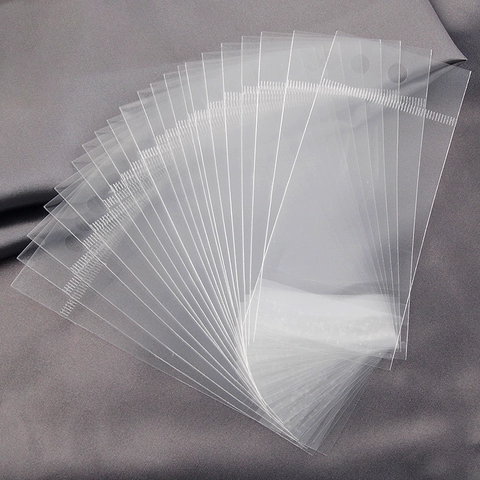 Bolsas De Embalaje Para Joyas Plástico OPP Transparente Con Cabezal De Papel Agujero De Suspensión Autoadhesivas Para Collares