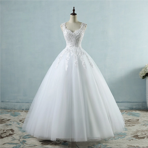 Elegante Vestido De Novia De Encaje Blanco Escote En V Profundo Sin Mangas Silueta De Gala Espalda Corsé Bordado