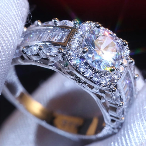 Elegant Brass Cubic Zirconia Engagement Ring For Women Featuring Round Main Stone With Halo And Baguette Side Stones Luxury Jewelry