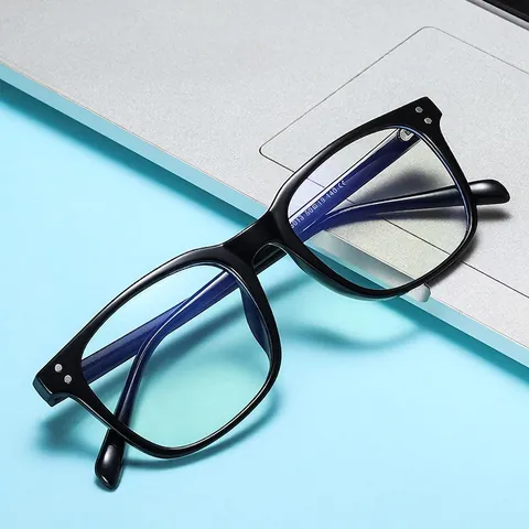 Occhiali Anti Luce Blu Quadrati TR90 Design Retro Con Borchie Blocco Luce Blu Montatura Ottica Unisex
