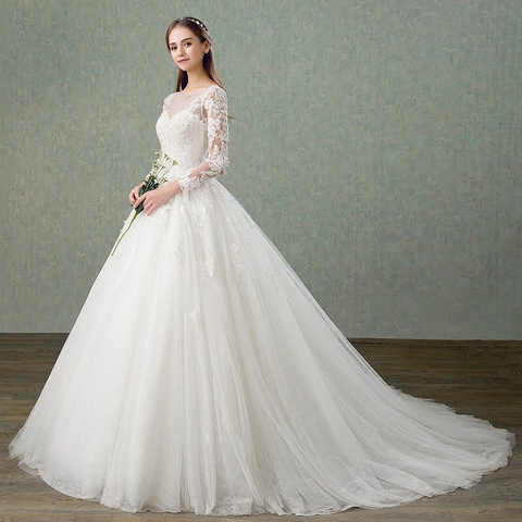 Élégante Robe De Mariée En Dentelle À Manches Longues Robe De Bal Décolleté Illusion Traîne Cathédrale Robe Nuptiale