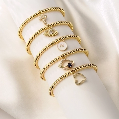 Bracciale Di Perline In Rame Di Moda Con Ciondoli Malocchio Croce Cuore Saturno Gioielli Elastici In Zircone Per Donne