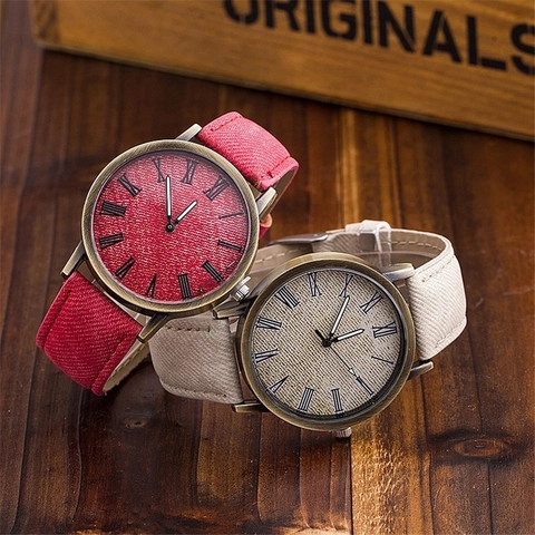 Orologio al Quarzo in Lega Vintage per Donna Numeri Romani Trama Denim Cinturino in Similpelle Cassa in Bronzo Moda Casual