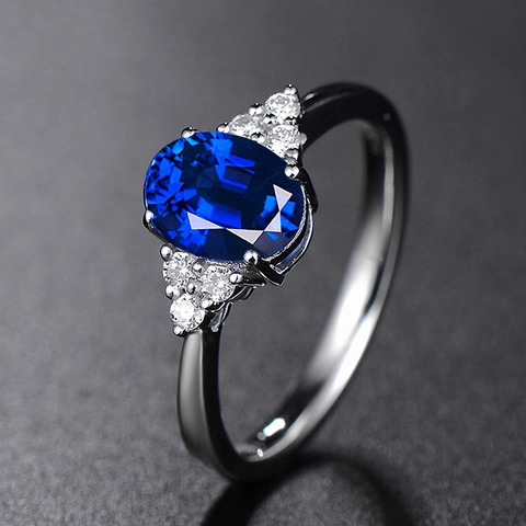 Anello Aperto Regolabile in Rame con Strass Blu Ovale per Donna Elegante Montatura a Quattro Griffe Gioielli di Moda