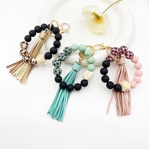 Pulsera Llavero De Cuentas De Silicona Con Cuenta De Madera Hexagonal Y Borla De Cuero PU Llavero De Leopardo Mujer