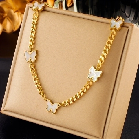 Collier en Acier Inoxydable pour Femme avec Pendentif Papillon Étoile Mauvais Œil Cœur et Strass Bijoux Multi Couches
