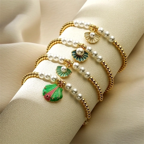 Bracciale con Ciondolo a Conchiglia in Rame in Stile Oceano per Donna Braccialetto con Perle Artificiali e Zirconia Intarsiata