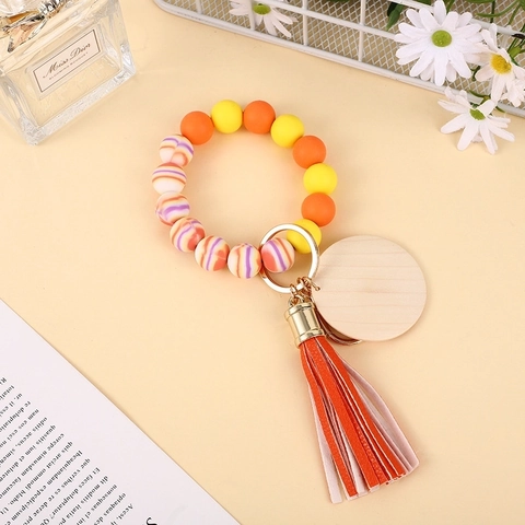 Porte-clés de Poignet en Perles de Silicone Bracelet Perlé Anneau avec Disque en Bois Gland en PU Support de Clé Femme