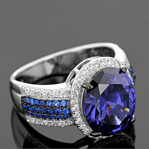 Luxury Oval Blue Zircon Ring With Halo White Rhinestones Crafted In For Women Wedding Engagement
