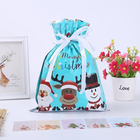 Christmas Drawstring Gift Bags Plastic Waterproof Santa Claus Reindeer Snowman Cartoon Patterns Ribbon Closure Holiday Party Candy Storage