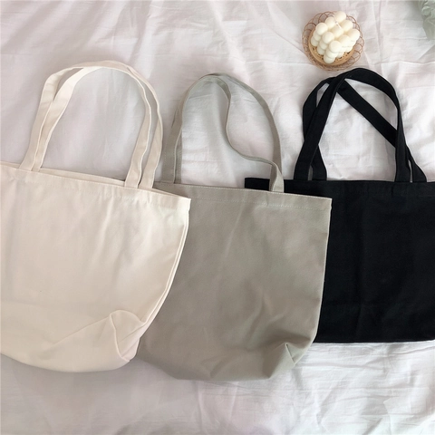 Sac Cabas en Toile Minimaliste Grande Capacité Couleur Unie Sac à Épaule pour Femmes Décontracté Style Japonais Harajuku Sac à Livres Shopping Écologique