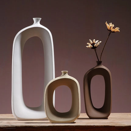 Jarrón De Cerámica Nórdico Arte Ovalado Hueco Decoración De Escritorio Soporte Para Flores De Cerámica Minimalista Moderno Y Ramas De Flores De Ciruelo Artificiales