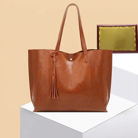 Damen Vintage Öl Wachs PU Leder Eimer Umhängetasche Große Kapazität Einfache Tote Handtasche Mit Quaste Magnetverschluss