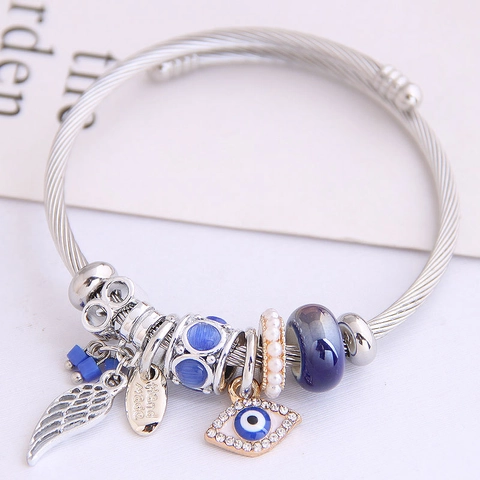 Modieuze Boze Oog Engelenvleugels Charmearmband Voor Dames Legering Kralen Gedraaide Staaldraad Armring Strass Kunstparel