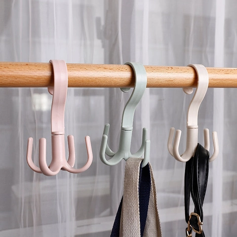 Rotierender Vier-Klauen-Haken Mehrzweck-Kleiderbügel Kunststoff Tasche Schal Gürtel Lagerung Kleiderschrank Organizer