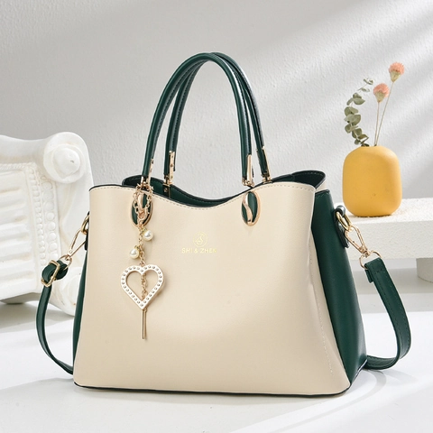 Bolso De Mano Para Mujer De Color Contrastado Cuir PU Bolso Bandolera Con Colgante De Perla Artificial Corazón Elegante