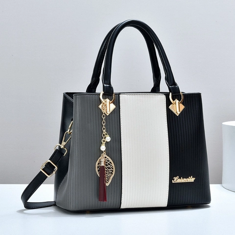 Sac à Main Femme Mode Cuir PU Design Color Block Grande Capacité Fourre-tout Sac à Épaule Avec Pendentif Feuille Gland Bandoulière