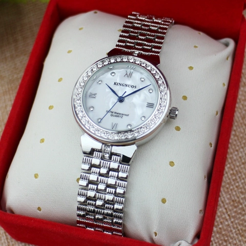 Montre Quartz Luxe Femme Lunette Strass Bracelet Acier Inoxydable Étanche Chiffres Romains Cadran Nacre Montre Bracelet