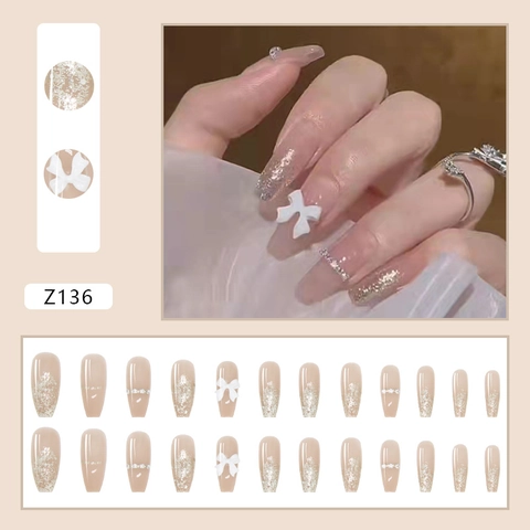 Faux Ongles Coffin Dégradé Rose Nu Avec Nœud 3D Et Strass Paillettes Argentées Ongles Élégants Pour Femmes