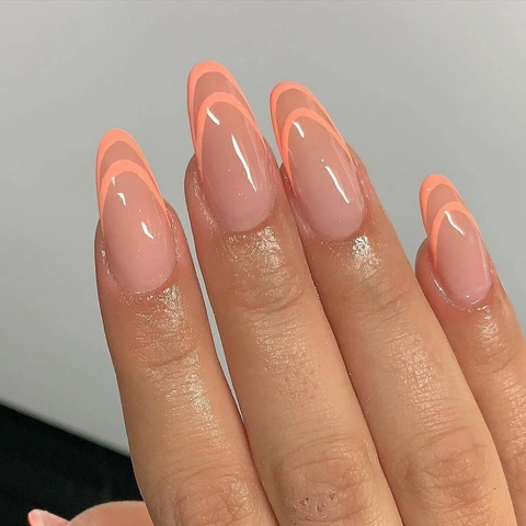 Unghie Finte Press On Forma Mandorla Base Rosa Nude Design Doppia Linea Arancione Francese Finitura Lucida Oval Unghie Artificiali