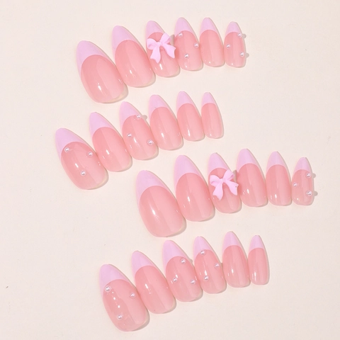 Unghie Finte Press On French Tip Rosa Forma Mandorla Con Fiocco 3D E Mini Künstliche Perle Manicure Artificiale Elegante