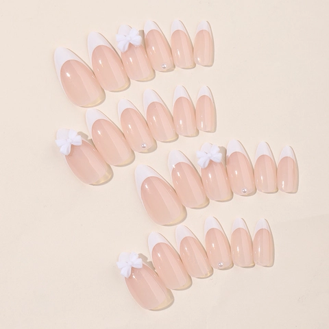 French Tip Press On Nägel Lange Mandelform Glänzendes Nudepink Mit Weißen Schleifen Und Künstliche Perlen Künstliche Fingernägel Für Damen