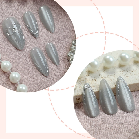 Kunstnagels Press On Nails Zilvergrijs Cat Eye Glanzend Amandelvorm Met 3D Metalen Strik Voor Dames