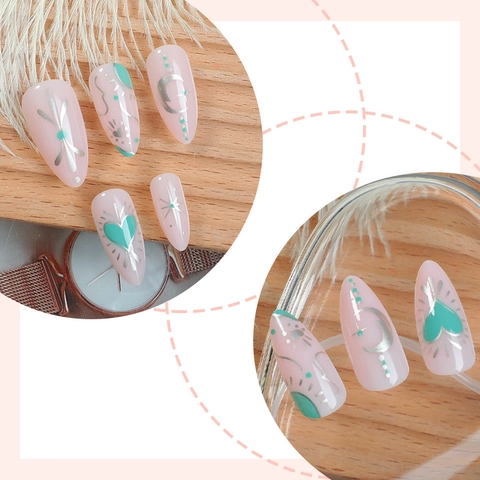 Unghie Finte A Mandorla Base Rosa Con Cuore Verde E Motivo Di Luna E Stelle Argento Elegante Stile Francese