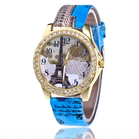 Montre Quartz Femme Imprimé Tour Eiffel Boîtier Alliage Lunette Strass Bracelet Cuir PU Mode Rétro Analogique