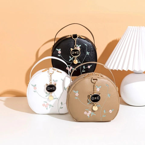 Bolso Bandolera Redondo Pequeño Para Mujer Cuero PU Bordado Floral Bolso De Mano Circular Con Colgante De Gato Elegante