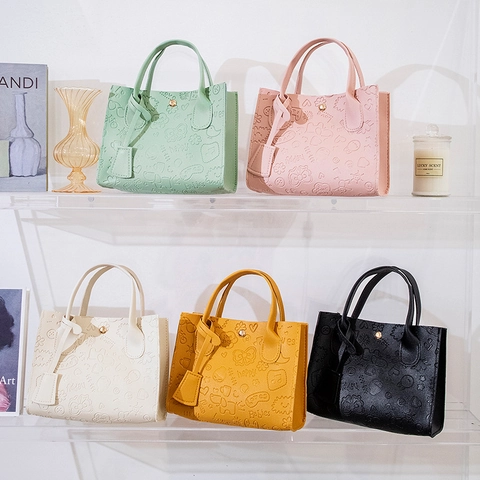 Frauen Cartoon Geprägte PU Leder Handtasche Süße Koreanische Stil Tote Schulter Umhängetasche Magnetische Schnalle