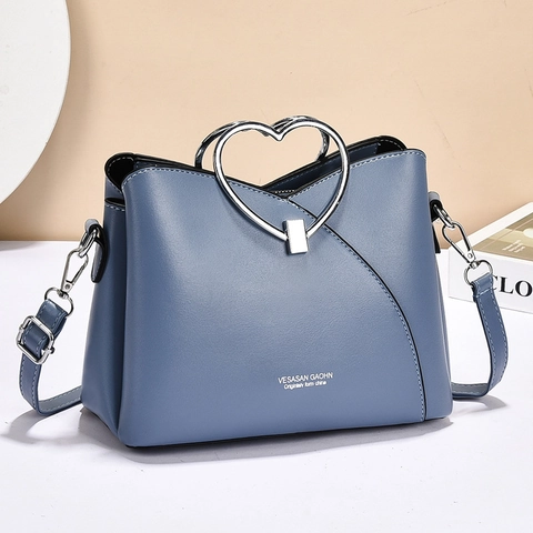 Bolso De Mano De Cuero PU Con Asa De Metal En Forma De Corazón Bolso De Hombro Para Mujer Elegante Moda Color Sólido