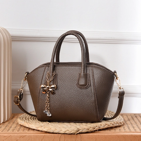 Borsa A Mano In Pelle PU Trama Litchi Chic Per Donna Borsa A Tracolla Versatile Con Pendente A Fiocco Dorato
