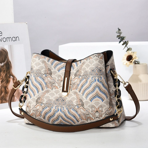 Vintage Damen Umhängetasche Jacquard Stoff Bucket Handtasche Kontrast PU Leder Riemen Metallkette Retro Wolkenmuster