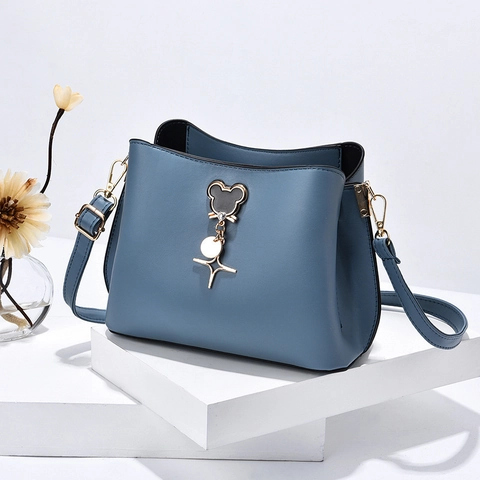 Bolso Cubo De Cuero PU Para Mujer Bolso De Hombro Moderno Bandolera Con Correa Ajustable Y Colgante De Estrella