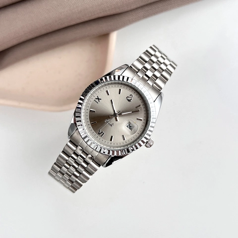 Orologio Al Quarzo Da Donna Bracciale Acciaio Inossidabile Lunetta Scanalata Quadrante Sole Data Numeri Romani Lusso